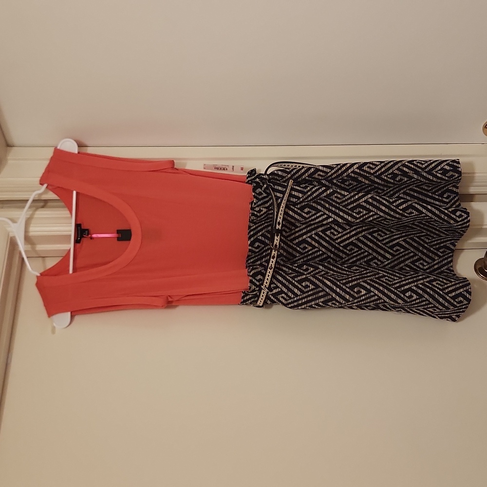 Pink dress with thin belt, tan & black bottom pattern
